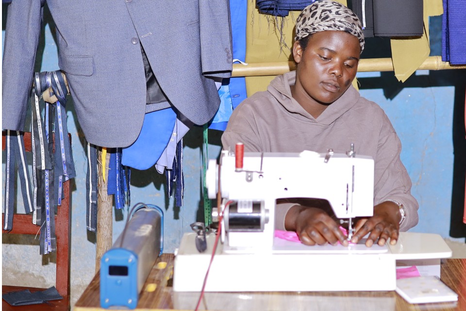 SunKazi entrepreneur using solar equipment